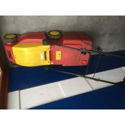 grasmaaier en verticuteer machine