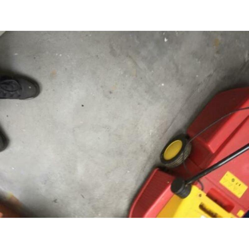 grasmaaier en verticuteer machine