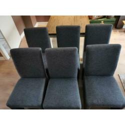 Zes antraciete, stoffen eetkamerstoelen