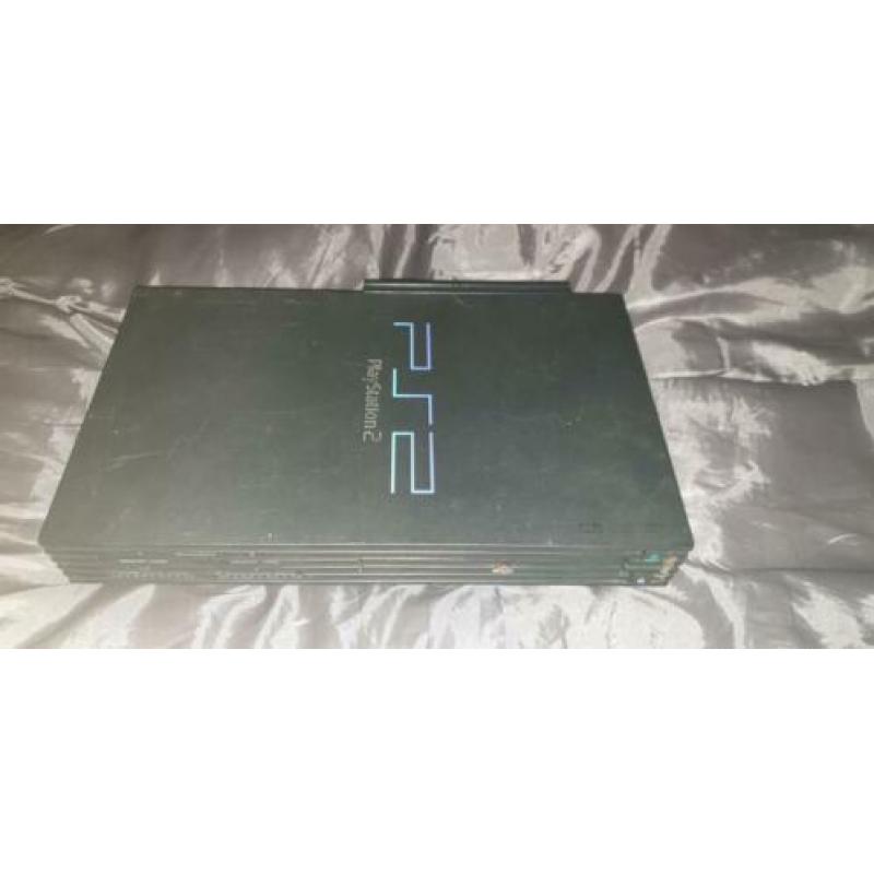 (Defecte) Playstation 2 Phat incl. Network Adapter