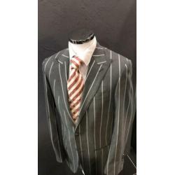 Grijs colbert van SUITSUPPLY. Maat 44. Slimfit