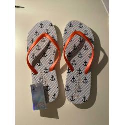Teen slippers blauw wit zwart roze nieuw maat 38/39