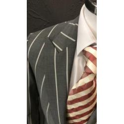 Grijs colbert van SUITSUPPLY. Maat 44. Slimfit