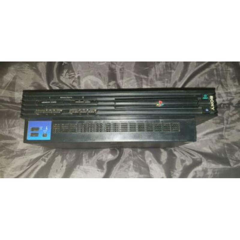 (Defecte) Playstation 2 Phat incl. Network Adapter