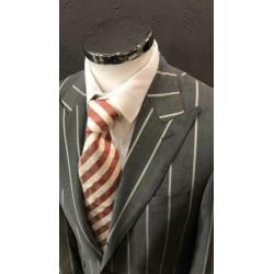 Grijs colbert van SUITSUPPLY. Maat 44. Slimfit