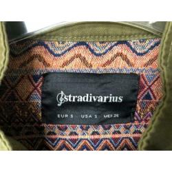 Canvas jas Stradivarius Ibiza look.