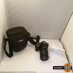 Pentax K100D met Sigma 28-300 mm DL Hyperzoom lens en tas