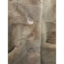 Zwarte en beige winterjassen. Allebei 50eur