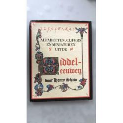 Boek Alfabetten, cijfers en miniaturen uit de Middeleeuwen
