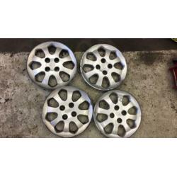Set originele 14 inch Kia wieldoppen
