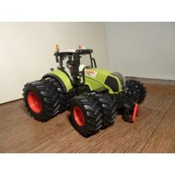 Te koop Siku Claas 840 Axion dubbellucht.