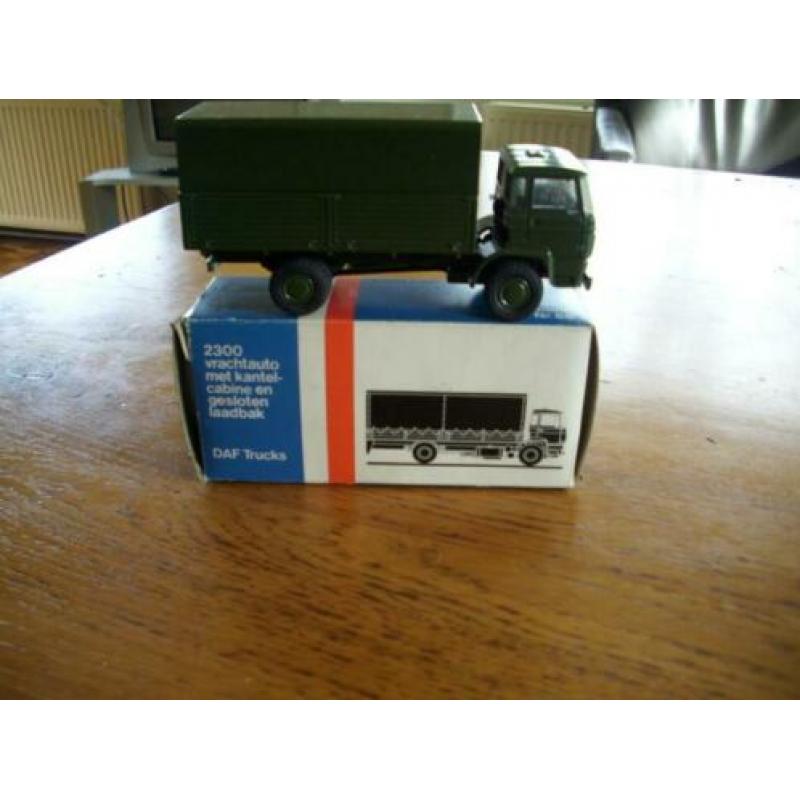 militaire DAF,s met huif in doos nieuw .& trailer DAF .