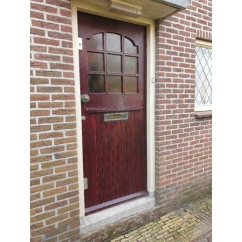Hardhouten buitendeur breed 90,5 hoog 211,5 dik 4 cm.