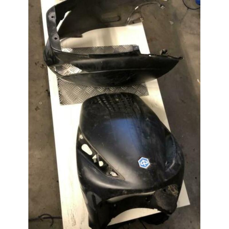 Piaggio zip kappen onderdelen