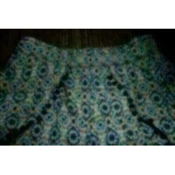 Short mt 34 dunne stof,met bolletjesrand,blauw/wit/oranje