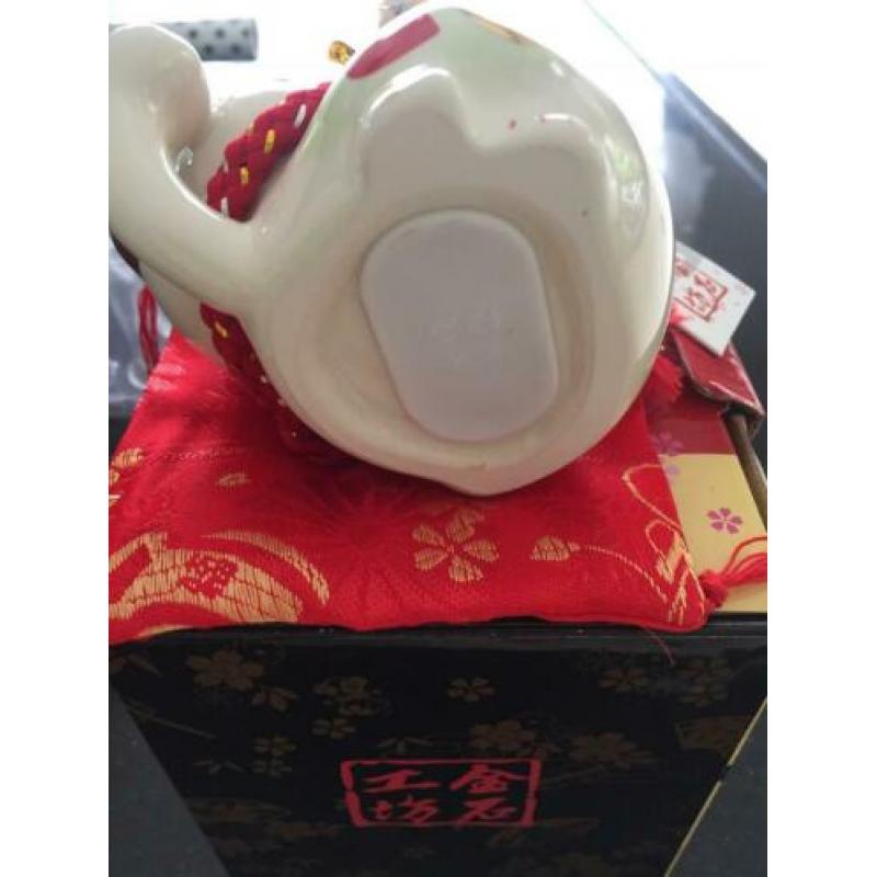 Nieuwe porseleinen Chinese spaarpot