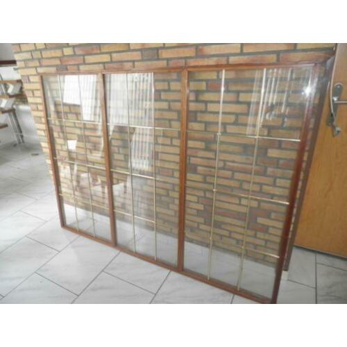 merbau raamwerk met glas in koper