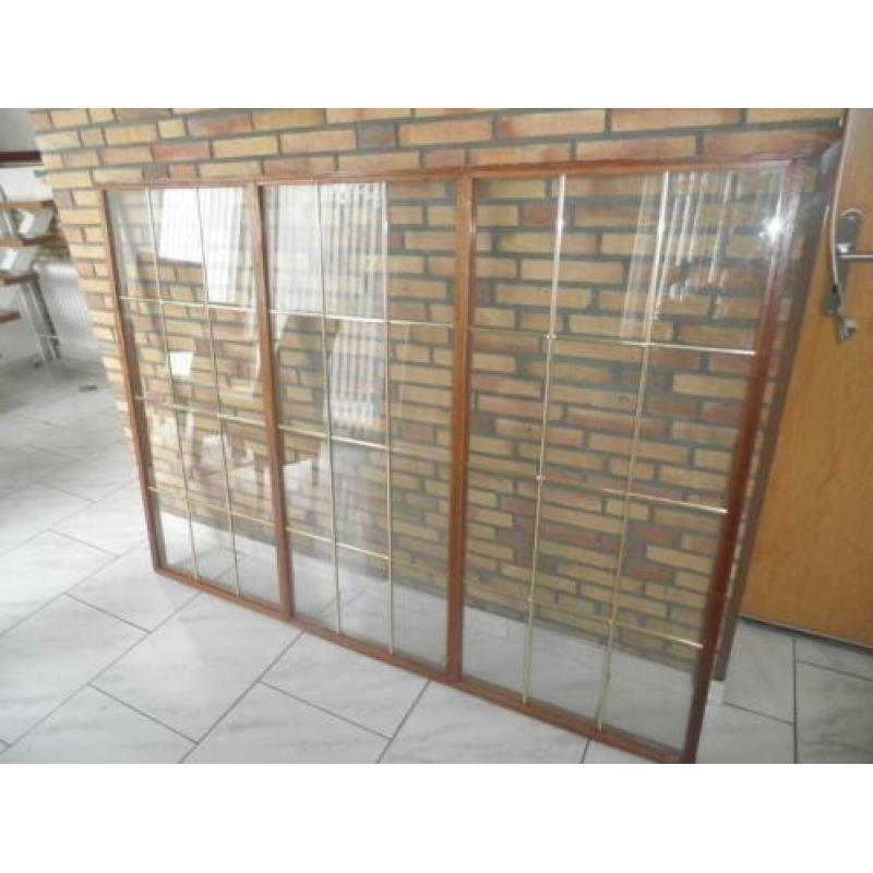 merbau raamwerk met glas in koper
