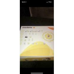 Dubbele elektrische kolfaparaat medela