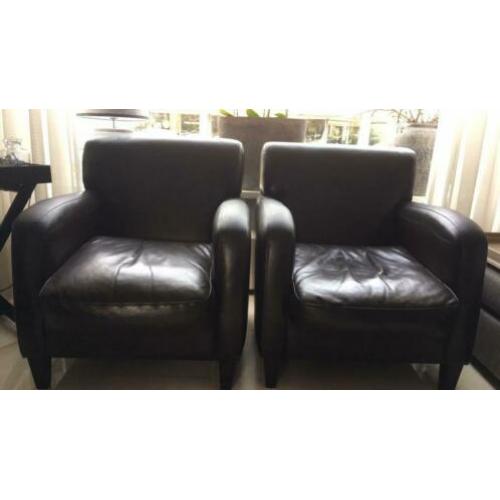 Twee lederen fauteuils donkerbruin