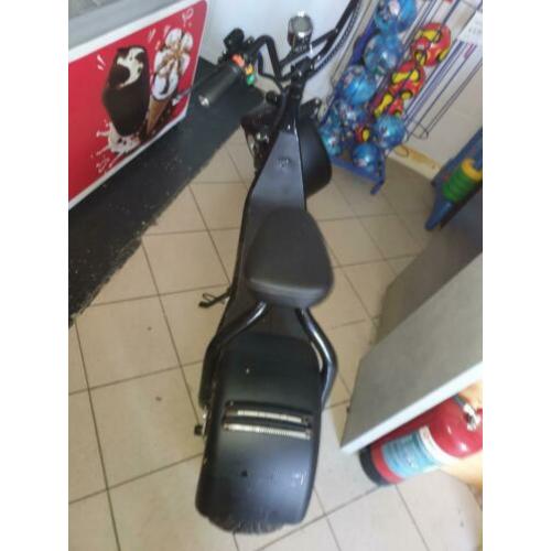 Bolht brommer (snoep partijhandel winkel scooter )
