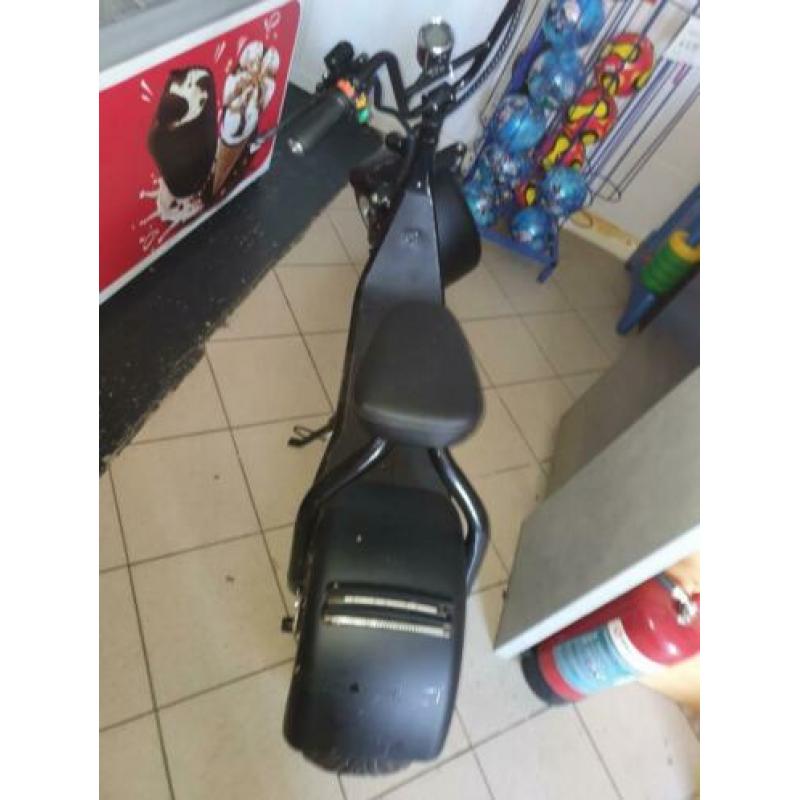 Bolht brommer (snoep partijhandel winkel scooter )