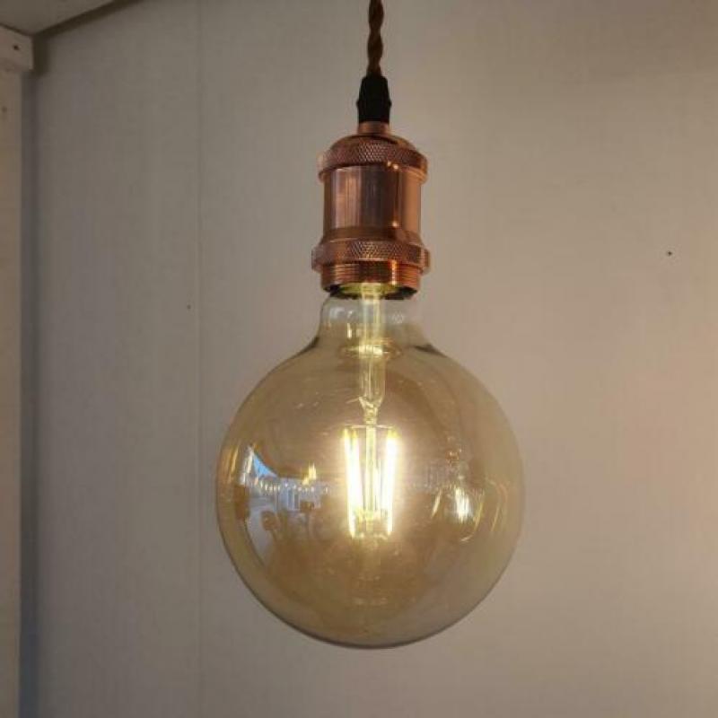 Plafondlamp van boomstam