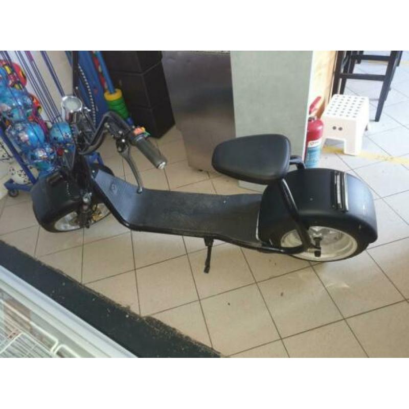 Bolht brommer (snoep partijhandel winkel scooter )