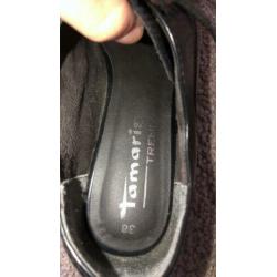 Nette schoenen, sjaal en vestje mogen gezamenlijk weg