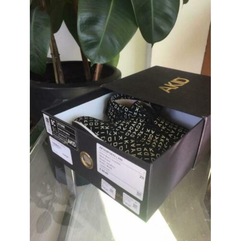 AKID stone black scrabble sneakers