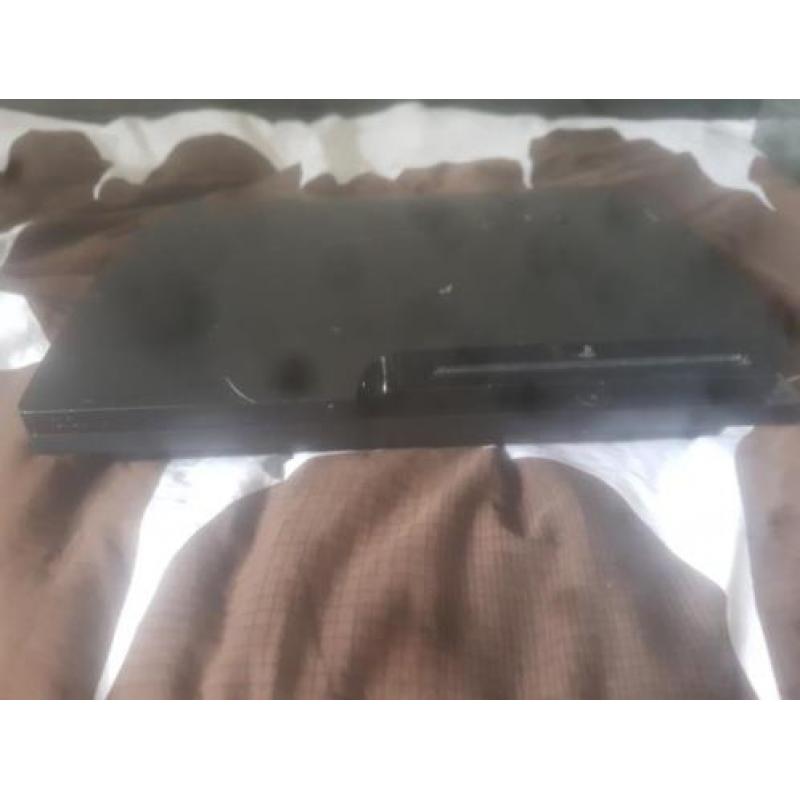 PlayStation 3 met 13 spellen 2 controllers en een headset